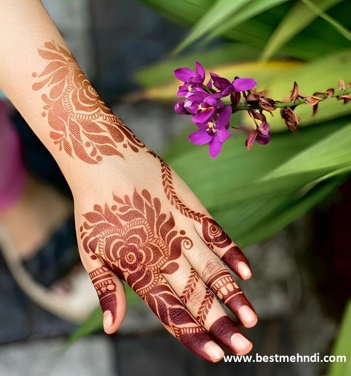 round mehndi design back hand