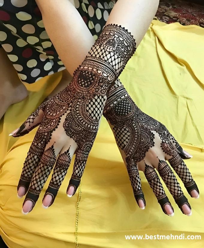 heart mehndi design back hand