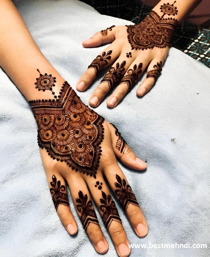 stylish:kmxb65i_2uy= back hand mehndi design