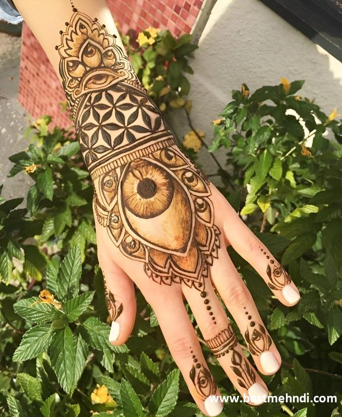 unique back hand mehndi design